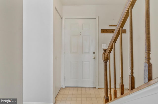 46726 Summit Ter Unit 136, Sterling, VA 20164 - doorway to outside with baseboards and stairway