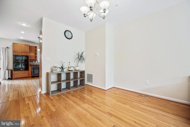 14019 Rockingham Rd, Germantown, MD 20874 - dining room featuring a chandelier, light wood-style flooring, baseboards, and recessed lighting