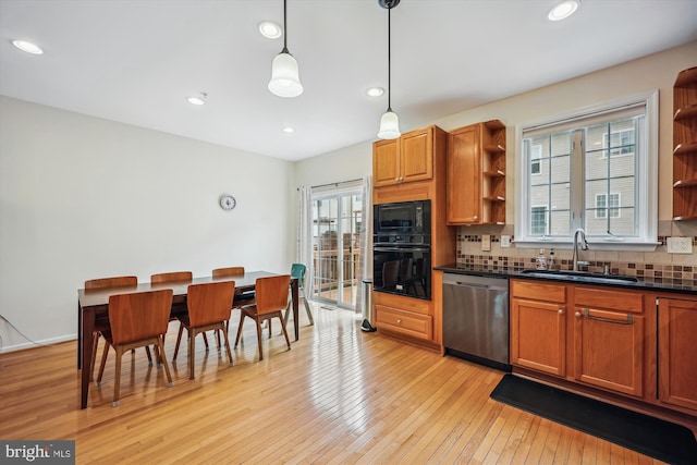 14019 Rockingham Rd, Germantown, MD 20874 - kitchen with a sink, open shelves, black appliances, decorative backsplash, and dark countertops