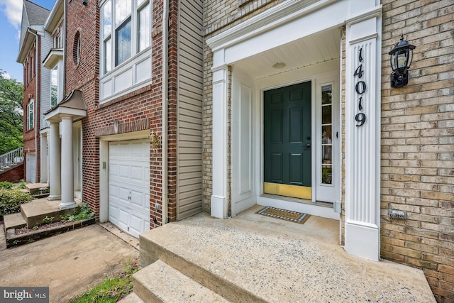 14019 Rockingham Rd, Germantown, MD 20874 - property entrance with brick siding, a garage, and driveway