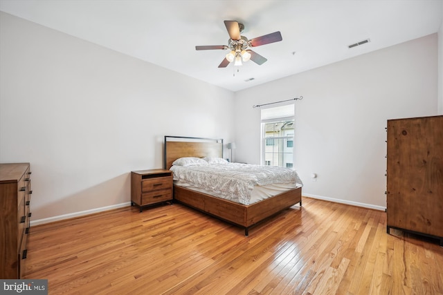 14019 Rockingham Rd, Germantown, MD 20874 - bedroom with light wood-type flooring, baseboards, and ceiling fan