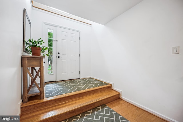 14019 Rockingham Rd, Germantown, MD 20874 - foyer entrance with wood finished floors and baseboards