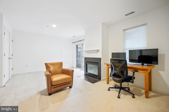 14019 Rockingham Rd, Germantown, MD 20874 - home office featuring carpet floors, a fireplace with flush hearth, and baseboards