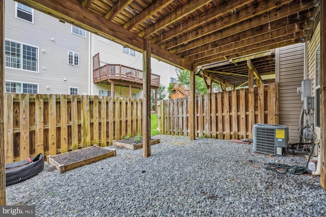 14019 Rockingham Rd, Germantown, MD 20874 - view of patio with cooling unit, fence, and a garden