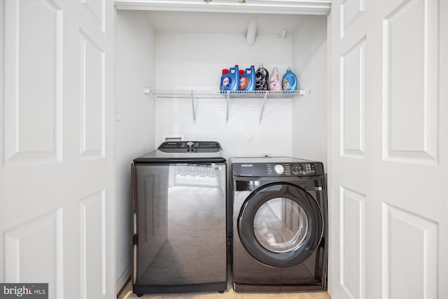 14019 Rockingham Rd, Germantown, MD 20874 - clothes washing area featuring washing machine and dryer