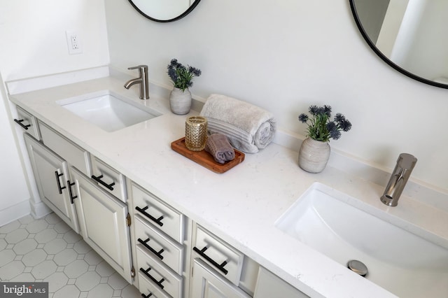 bathroom featuring double vanity and a sink