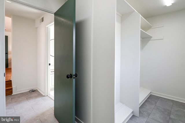 interior space featuring visible vents and tile patterned floors
