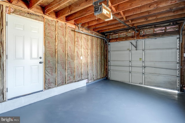 garage featuring a garage door opener