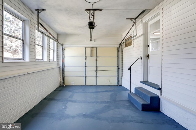 garage featuring a garage door opener