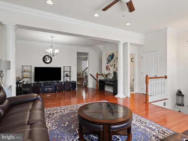 43260 Mitcham Sq, Ashburn, VA 20148 - living area featuring wood finished floors, ceiling fan, and decorative columns