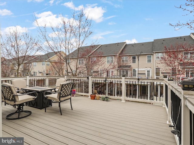 43260 Mitcham Sq, Ashburn, VA 20148 - wooden terrace featuring a residential view and outdoor dining area