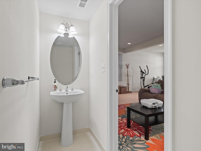 43260 Mitcham Sq, Ashburn, VA 20148 - bathroom with visible vents and baseboards