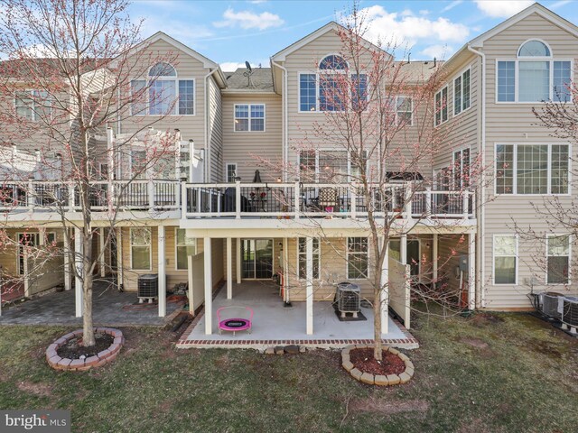 43260 Mitcham Sq, Ashburn, VA 20148 - back of house with a patio, central AC unit, and a yard