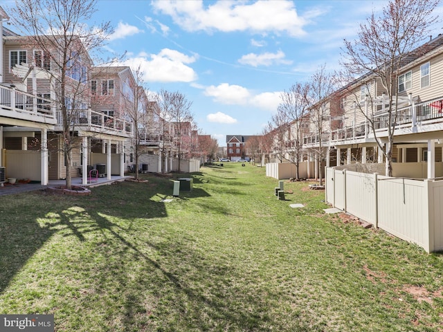 43260 Mitcham Sq, Ashburn, VA 20148 - surrounding community featuring a patio, a residential view, and a lawn