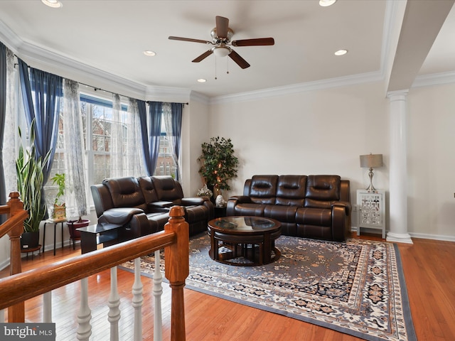 43260 Mitcham Sq, Ashburn, VA 20148 - living area with ornamental molding, a ceiling fan, wood finished floors, and ornate columns