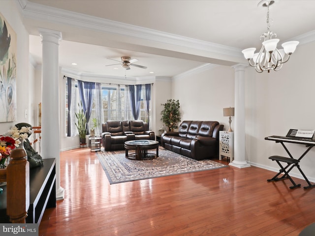 43260 Mitcham Sq, Ashburn, VA 20148 - living area featuring ornate columns, wood finished floors, a ceiling fan, and crown molding