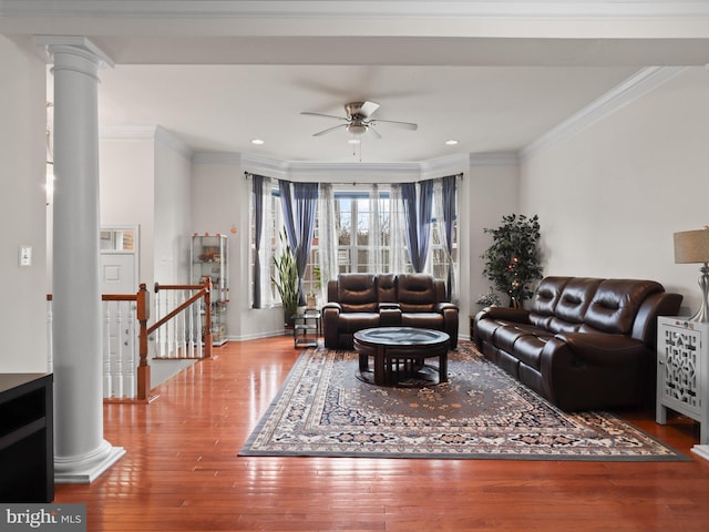43260 Mitcham Sq, Ashburn, VA 20148 - living area featuring ceiling fan, decorative columns, crown molding, baseboards, and wood finished floors