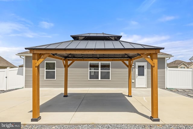 view of patio / terrace featuring a gazebo and fence