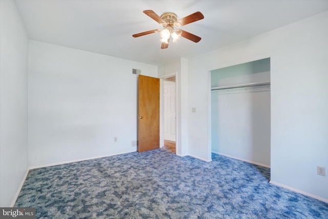 unfurnished bedroom with carpet flooring, baseboards, visible vents, and a closet