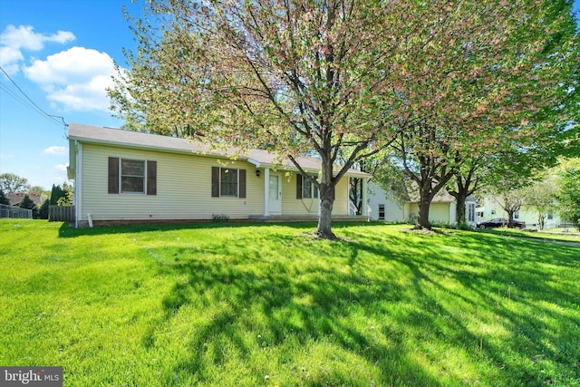 view of front facade with a front lawn