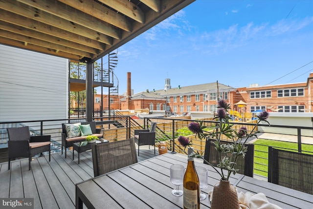 wooden deck featuring an outdoor hangout area and outdoor dining space