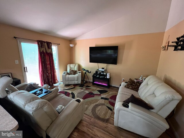 10604 Nast Dr, Cheltenham, MD 20623 - living room with wood finished floors and vaulted ceiling
