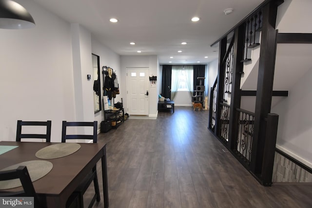 entrance foyer featuring dark wood-type flooring and recessed lighting