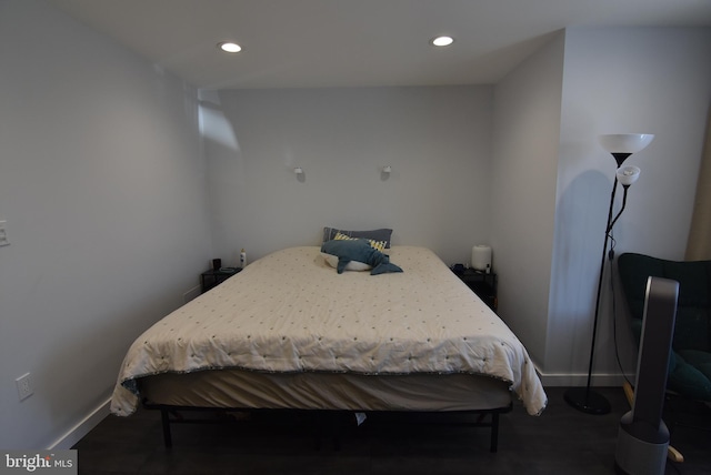 bedroom featuring baseboards and recessed lighting