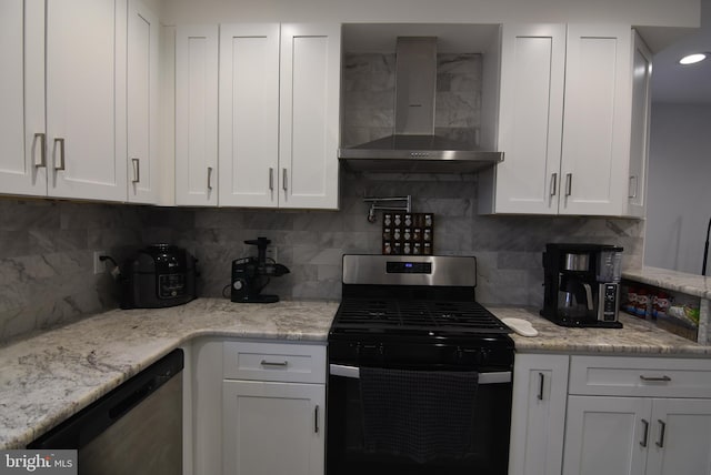 kitchen with stainless steel dishwasher, white cabinets, gas stove, and wall chimney exhaust hood
