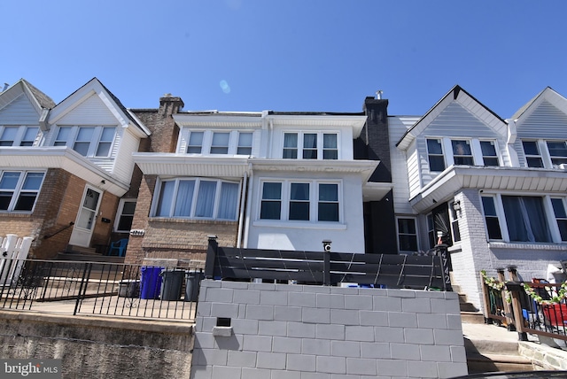 view of front of property with a fenced front yard