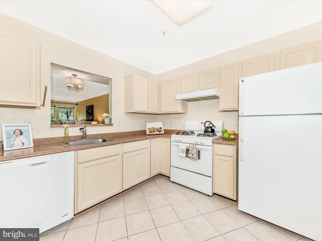 13107 Bridger Dr Unit 104, Germantown, MD 20874 - kitchen featuring white appliances, a sink, under cabinet range hood, cream cabinets, and light tile patterned floors