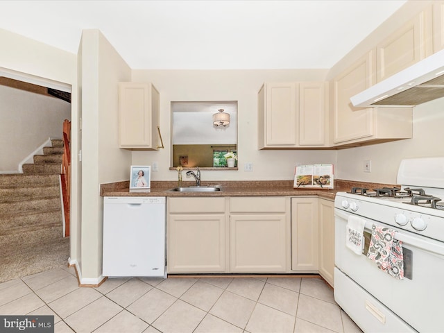 13107 Bridger Dr Unit 104, Germantown, MD 20874 - kitchen with white appliances, a sink, wall chimney exhaust hood, and light tile patterned floors