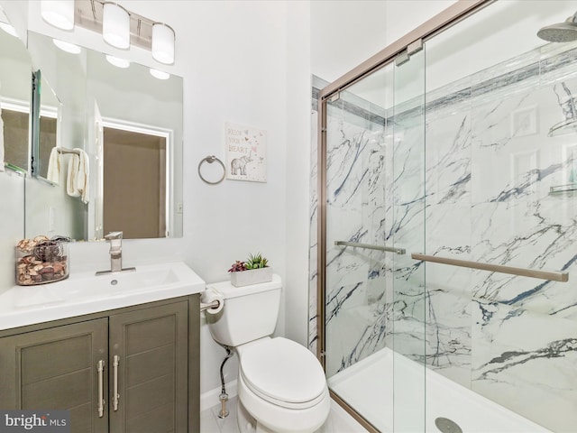 13107 Bridger Dr Unit 104, Germantown, MD 20874 - full bathroom with a marble finish shower, toilet, and vanity