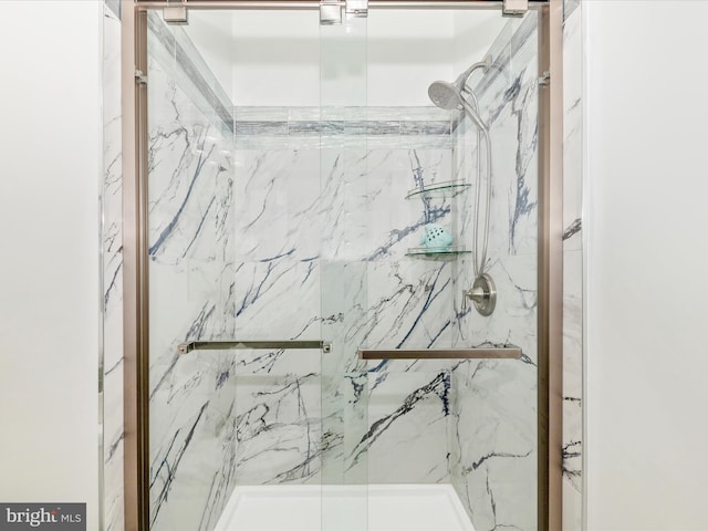 13107 Bridger Dr Unit 104, Germantown, MD 20874 - full bathroom with a marble finish shower