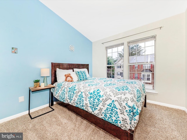 13107 Bridger Dr Unit 104, Germantown, MD 20874 - bedroom with carpet flooring, lofted ceiling, and baseboards