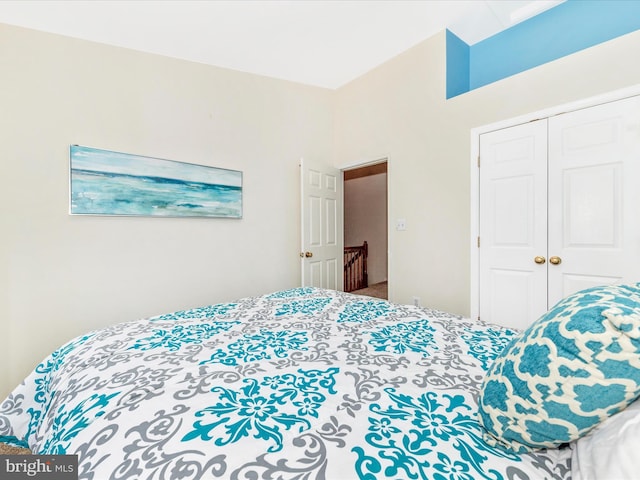 13107 Bridger Dr Unit 104, Germantown, MD 20874 - bedroom featuring a closet and carpet flooring