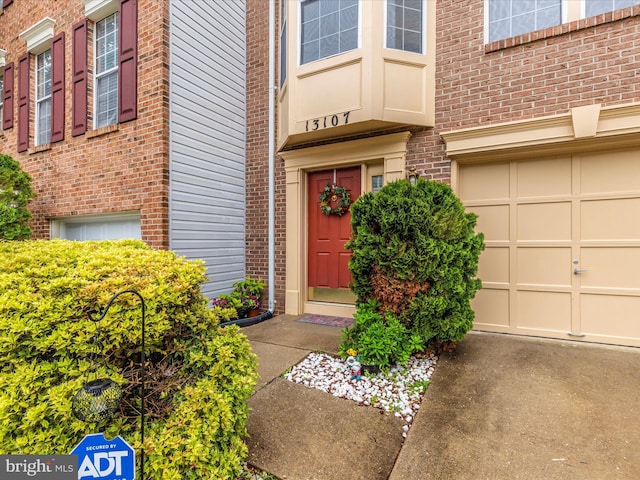 13107 Bridger Dr Unit 104, Germantown, MD 20874 - doorway to property featuring brick siding