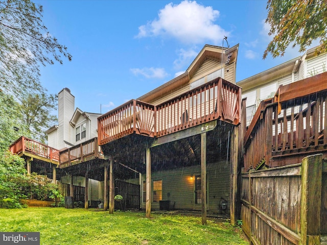 13107 Bridger Dr Unit 104, Germantown, MD 20874 - back of property with a wooden deck