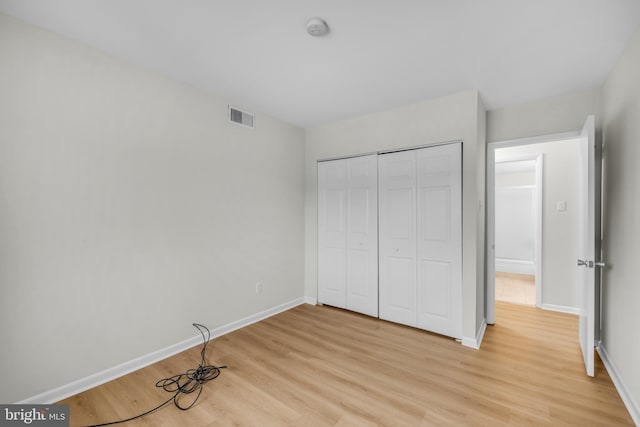 5414 Valley Green Dr Unit D4, Wilmington, DE 19808 - unfurnished bedroom featuring light wood-type flooring, baseboards, and a closet