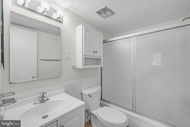 5414 Valley Green Dr Unit D4, Wilmington, DE 19808 - bathroom with toilet, vanity, tile walls, and a wainscoted wall