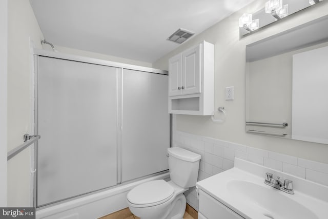 5414 Valley Green Dr Unit D4, Wilmington, DE 19808 - full bathroom with vanity, toilet, and tile walls