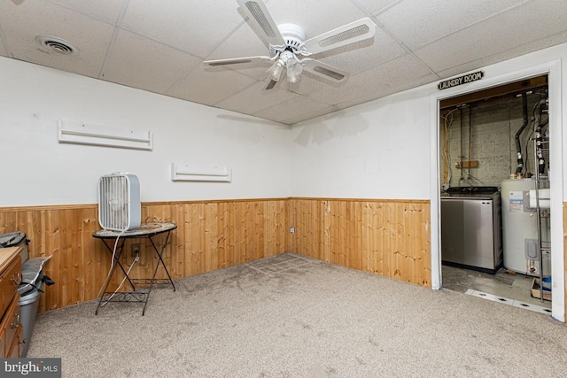 950 Wampler Ln, Westminster, MD 21158 - below grade area with washer / clothes dryer, a wainscoted wall, water heater, a paneled ceiling, and carpet floors