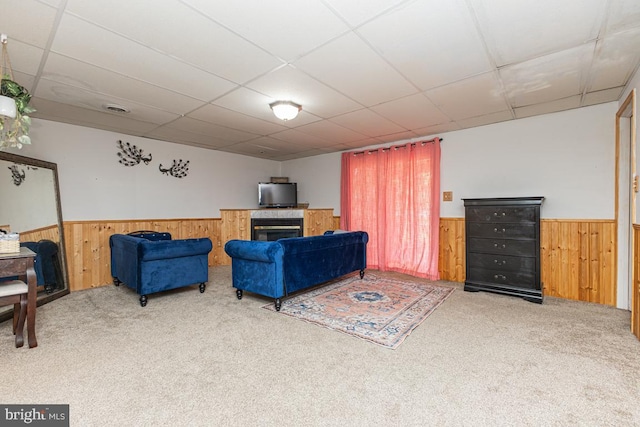950 Wampler Ln, Westminster, MD 21158 - living area with a wainscoted wall, wood walls, carpet floors, a drop ceiling, and a glass covered fireplace