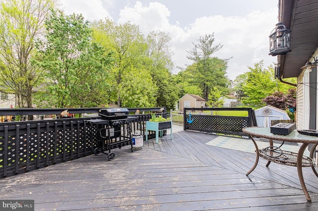 950 Wampler Ln, Westminster, MD 21158 - deck with a storage unit, an outbuilding, and a grill
