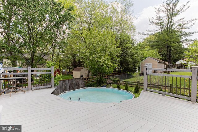 950 Wampler Ln, Westminster, MD 21158 - view of pool with a wooden deck, a shed, an outbuilding, and fence