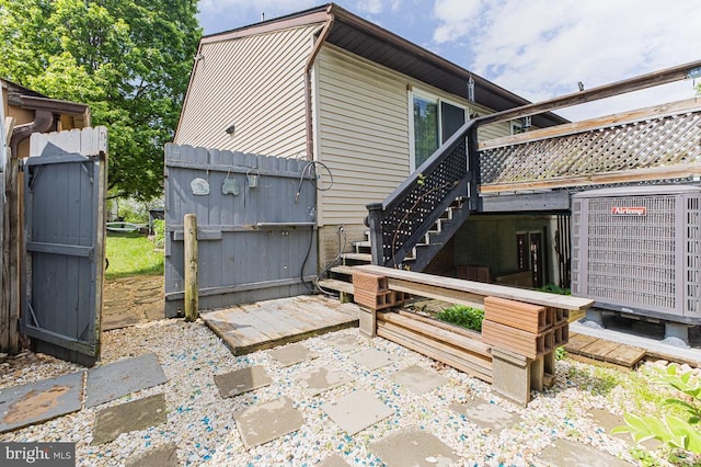 950 Wampler Ln, Westminster, MD 21158 - view of home's exterior featuring stairway, central AC unit, and a deck