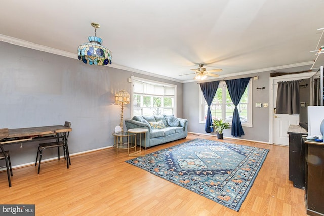 950 Wampler Ln, Westminster, MD 21158 - living area featuring crown molding, wood finished floors, a ceiling fan, and baseboards
