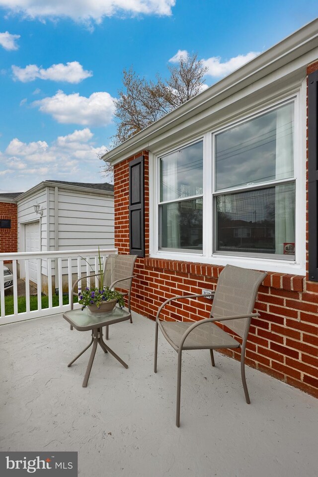 view of patio featuring a garage