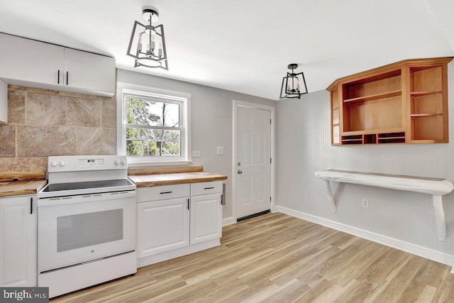 kitchen with white cabinets, baseboards, light wood-type flooring, tasteful backsplash, and white electric stove