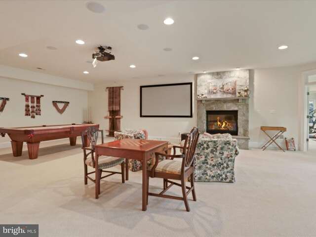 interior space with light colored carpet, pool table, a fireplace, baseboards, and recessed lighting